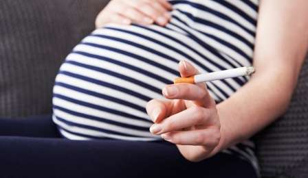 A Pregnant Woman Smoking