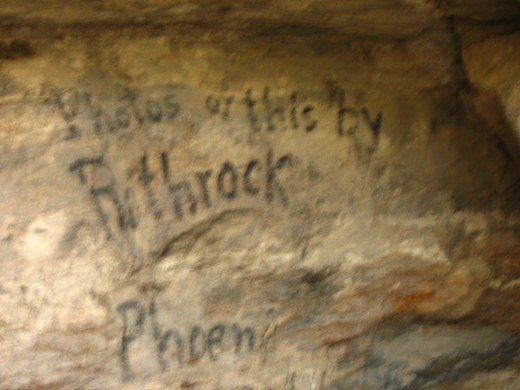 Later visitors to Montezuma's well left graffiti, over 100 years ago.
