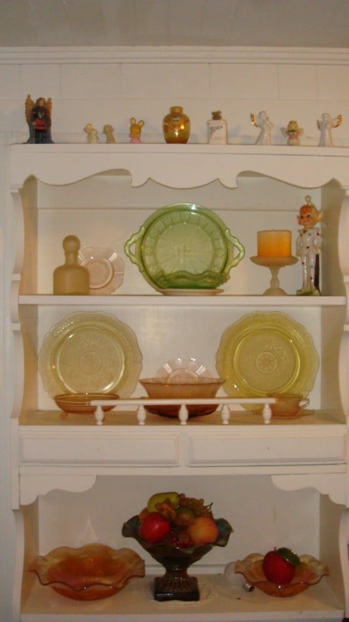 This is my Depression Glass Collection. Not all the same pattern, but still has what I need! (The clown is the "Watcher of Glass" lol) 