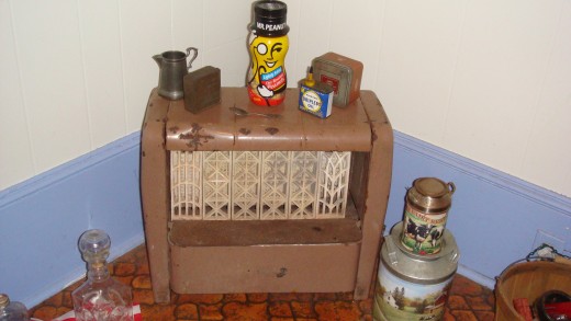 This is an old gas heater. They are illegal to hook up now, but it added a nice touch to the antiquity of my house! (Mr. Peanut left tho lol)