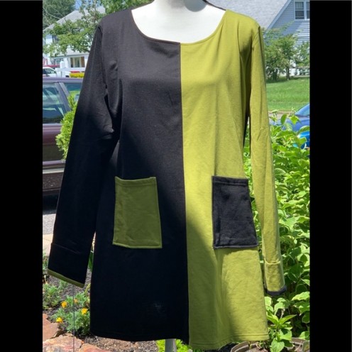 Dress V Lime and Black Dress is a simple dress that will carry you from Church and work to dinner. Material: 100%. Approximate Measurements: Bust: 22”; Length: 31”; Sleeves: 26”