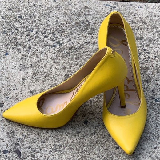 Pre-owned.  These are a pair of beautiful yellow leather Sam Edelman heels. It will take you from the office to dinner. Please notice there are minor scuffing to the shoes. $45