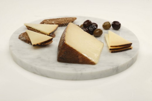 Manchego has a nutty, buttery flavor and a is considered a "hard" variety of cheese. (BH)