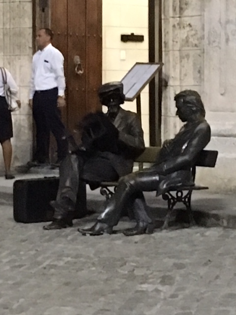 Statues in Plaza de San Franscisco in Havana, Cuba. One is alive. Can you tell which? 