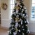 This is a smaller tree in an office. It uses the white and gold theme quite effectively