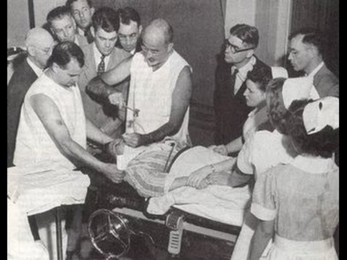 A doctor performing a lobotomy to treat a patient with severe symptoms.