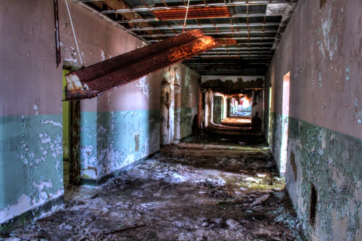 Other parts of the building are decayed like this hallway.