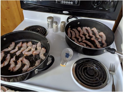 two pans with thin bacon