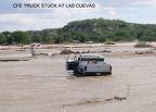 Better to be patient!  Truck stuck on flooded road during hurricane