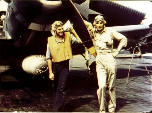 Ensign George Gay, right, poses in front of a Devastator, May 1942.