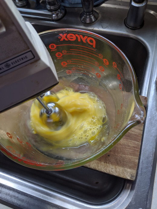 Beat eggs with mixer