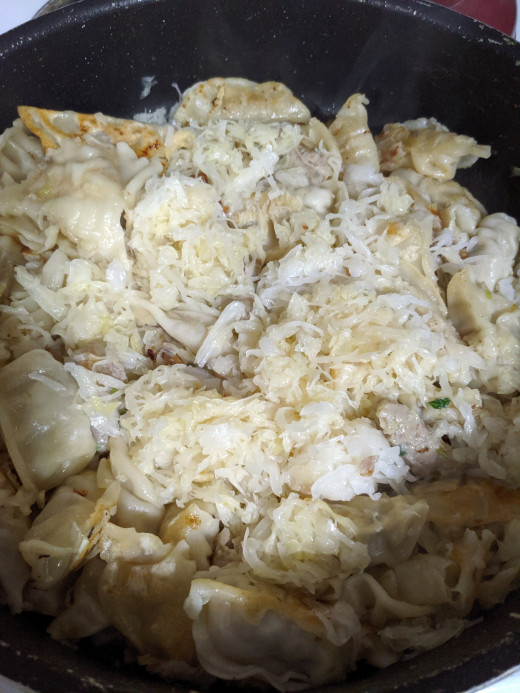 Loosen and add sauerkraut.