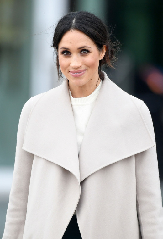 Meghan Markle poses for the cameras. 