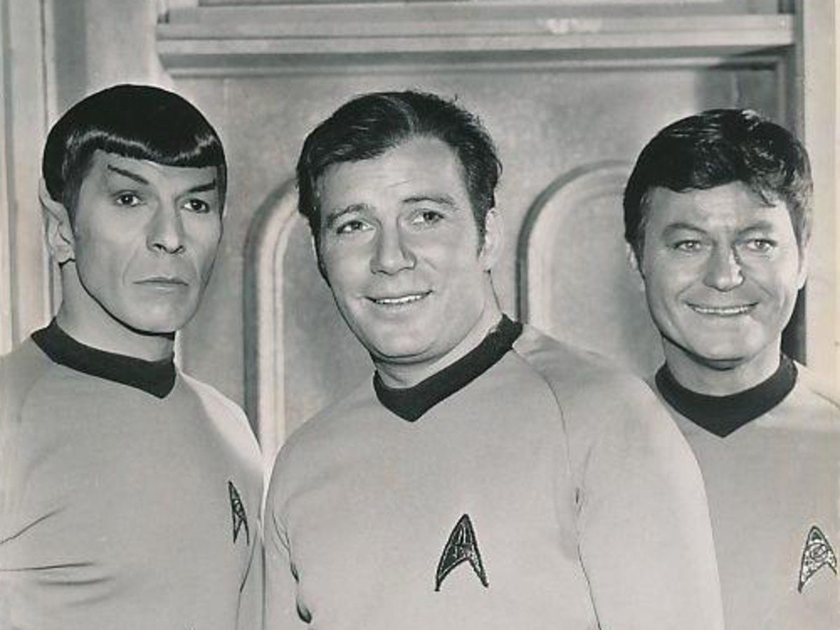 Mr. Spock (Leonard Nimoy), Captain Kirk (William Shatner), Dr. McCoy (DeForest Kelley)