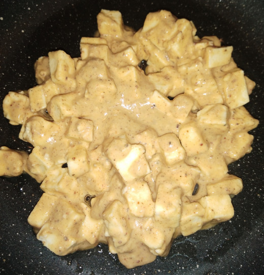 Heat 1-2 teaspoons of oil in a pan, add gram floor coated paneer.