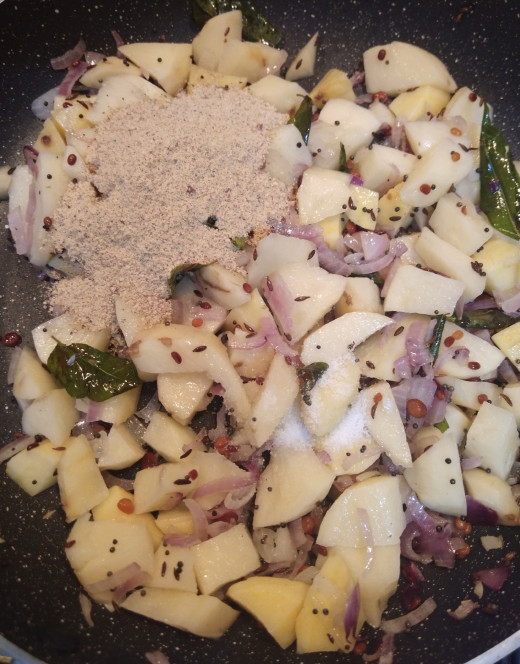 Add ground chettinad masala and salt.