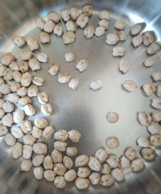 Take about 1/2 cup of chickpeas in a vessel.