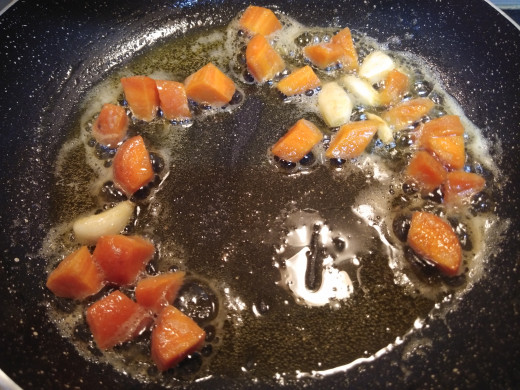 To this add chopped carrot and fry till it turns slightly soft. ( For about 2-3 minutes).