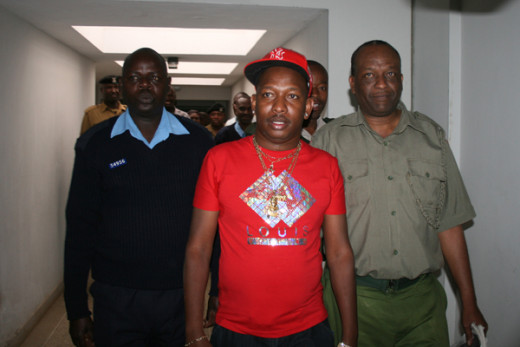 Mr. Mike Sonko being escorted along the court corridors.