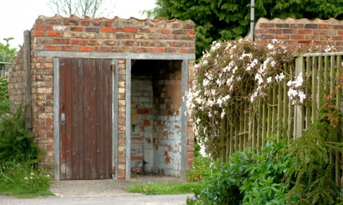 Although this outhouse is built of bricks, it is still considered an outhouse.
