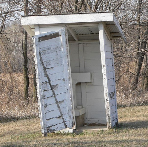 Even rough treatment cannot destroy the outhouse.