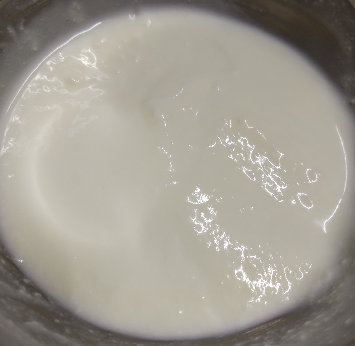 Take 1/4 cup of curd in a bowl and beat till it get creamy texture.