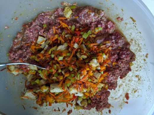 Add vegetable/bread mixture to meat mixture