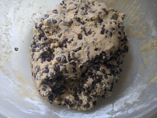 Squish chocolate chips into dough