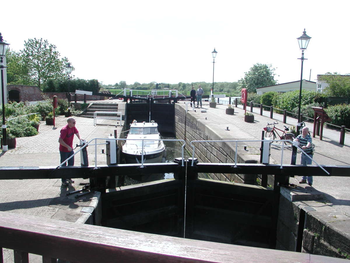 My husband and son helping a boater through the Beeston lock off the trent onto the canal