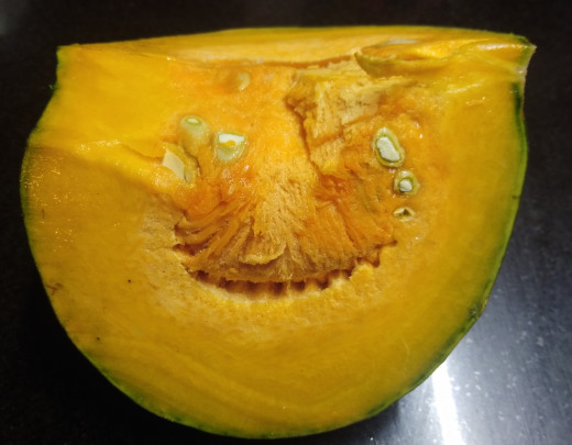 Wash yellow pumpkin to get rid of dirt if any.