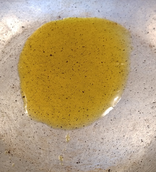 In a pan or pot, heat mustard oil. (or use any vegetable oil).