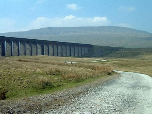 Whernside with Ribblehead Viaduct. Ingleborough is within sight near the olpposite - southern - end of this magnificent structure that was set for demolition until Transport Secretary Michael Portillo stepped in to secure a more realistic estimate   