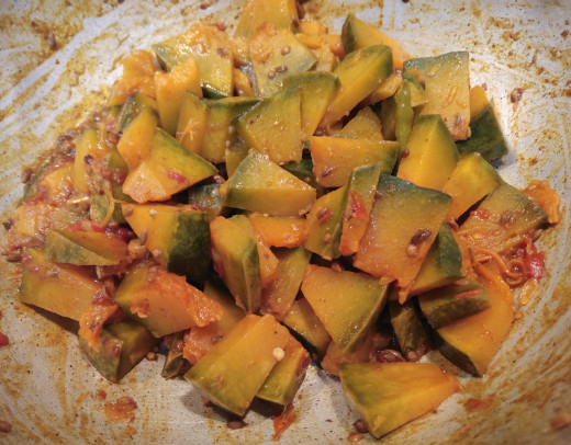 Cook until fully cooked. (This will take 10-15 minutes on medium flame). Check in between. Add more water if required. (In this stage pumpkin should break with light pressure but not mushy).