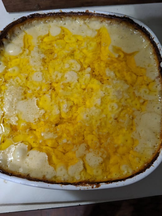 Melted butter pools on top. Stir back . Place back in oven. I baked it until potatoes were tender before I placed In bowl
