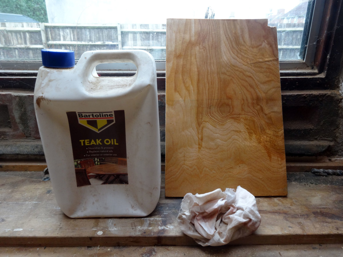 Teak oil rubbed into underside of shelf with a cloth, to nourish the wood and give it a bit of colour