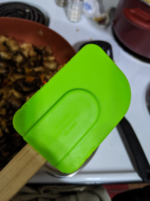 use spatula to remove rice from pan