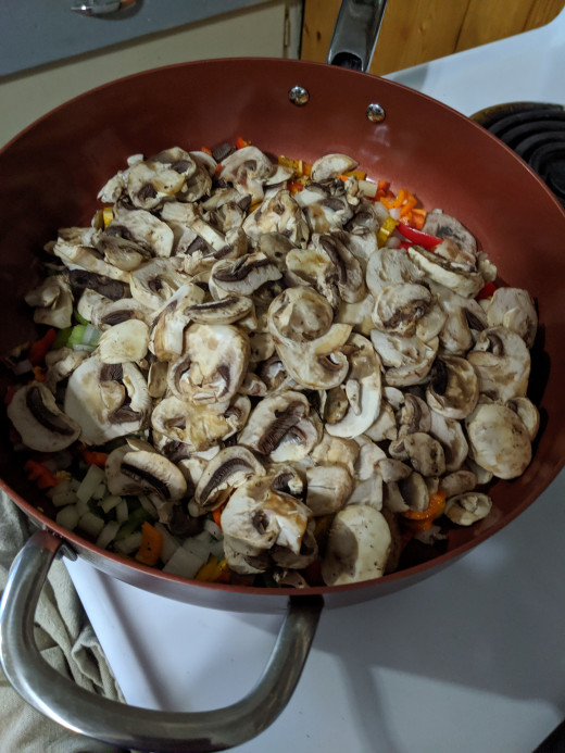 celery, peppers, onions and mushrooms in pan