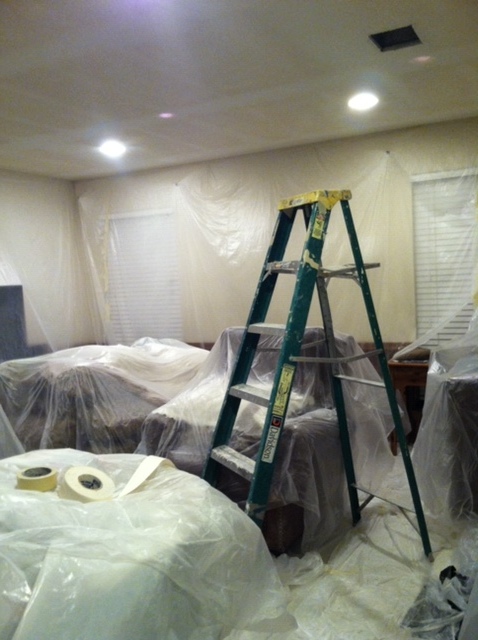 Furniture covered and drywall repairs being made. My wife and I did all of the repairs ourselve