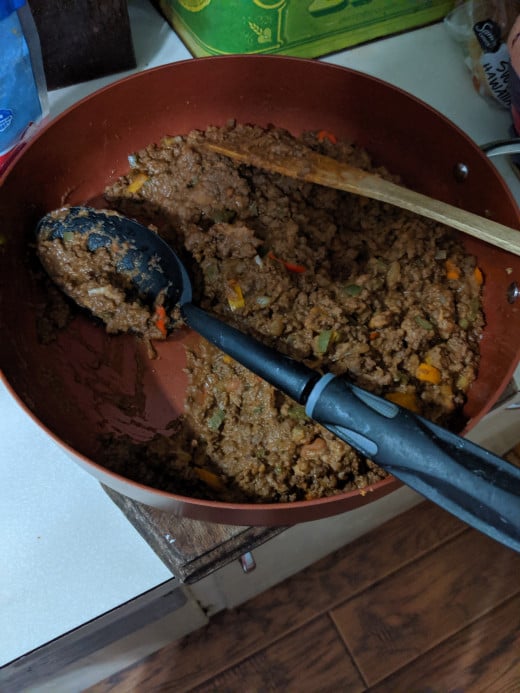 Add refried beans to burger mixture
