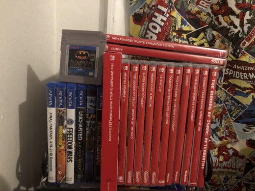 My collection of physical switch games, featuring Batman and a few vita games.
