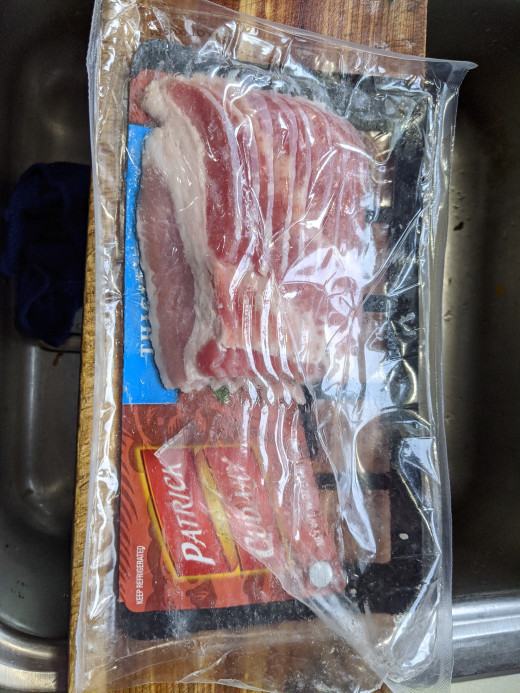 Package of cut strips of bacon