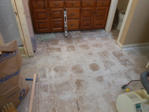 Tiles up exposing the bare floor