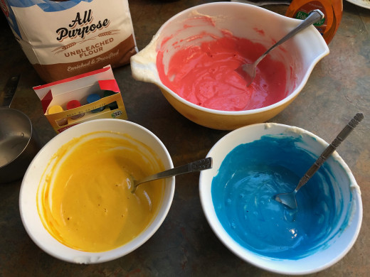 I divided up the mix into thirds before adding food coloring and mixed up primary colors