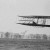 Orville in flight over Huffman Prairie in Wright Flyer II. Flight #85, approximately 1,760 feet (536 m) in ​40   1⁄5 seconds, November 16, 1904.