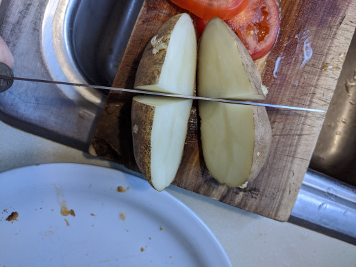 Cut potato so that there are eyes on each piece