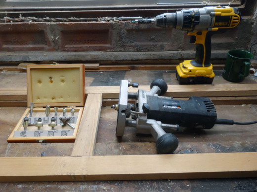 Router and router bits used for routing the glass recess and decorative mouldings.