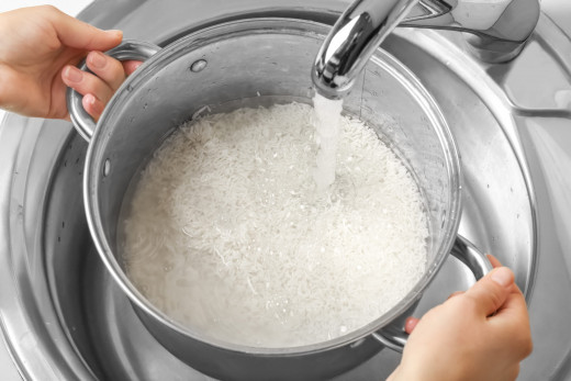 Rinsing Rice within a Pot with Water