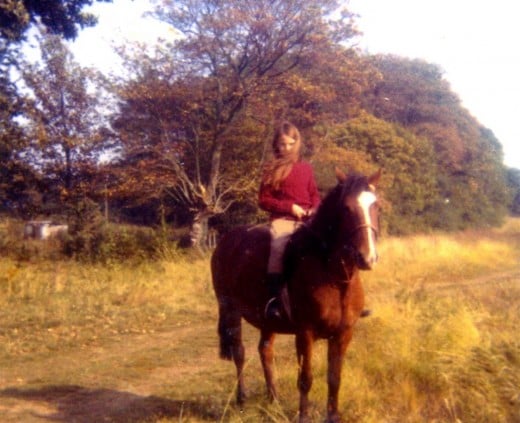Ingrid riding Tuppence outside our old house at South Wonston.