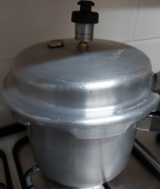 close the lid of pressure cooker and take 4 whistles or until lentils are cooked well (but not mushy). Switch off the flame and let the pressure release by itself.