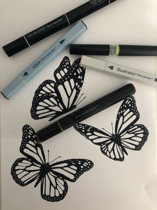 Here is a photograph of a work in progress with one of each of the collections I have. (As you can see, I like to draw butterflies!)
